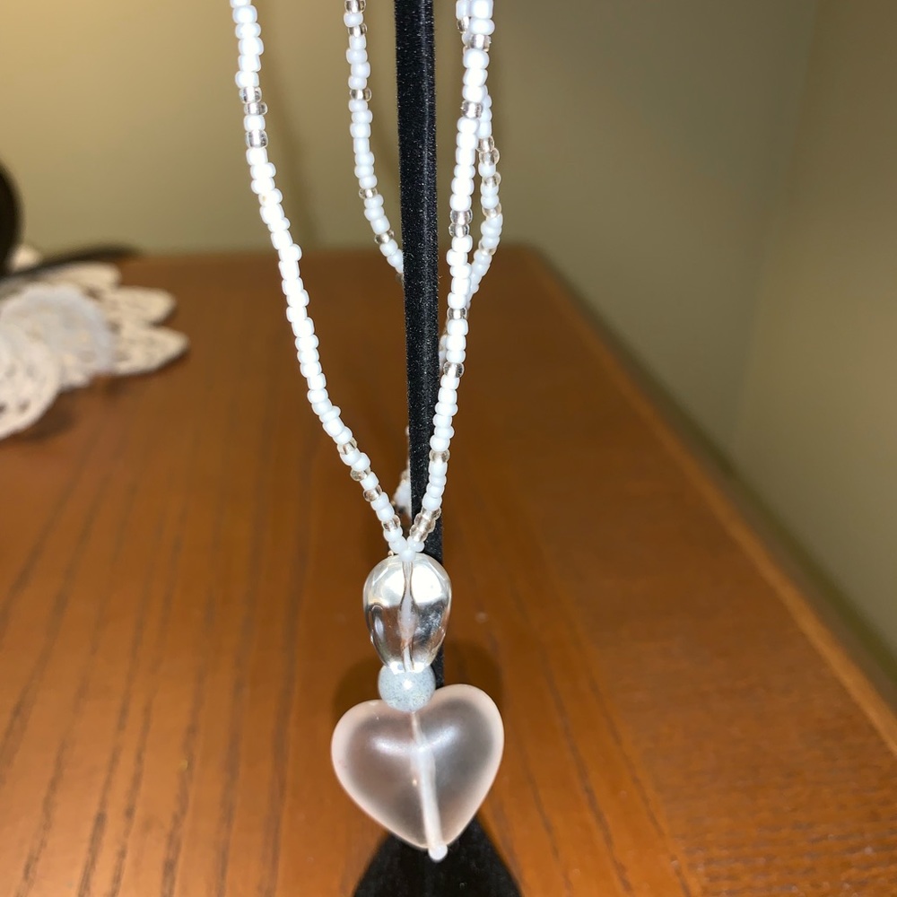 Clear plastic heart necklace on seed bead chain